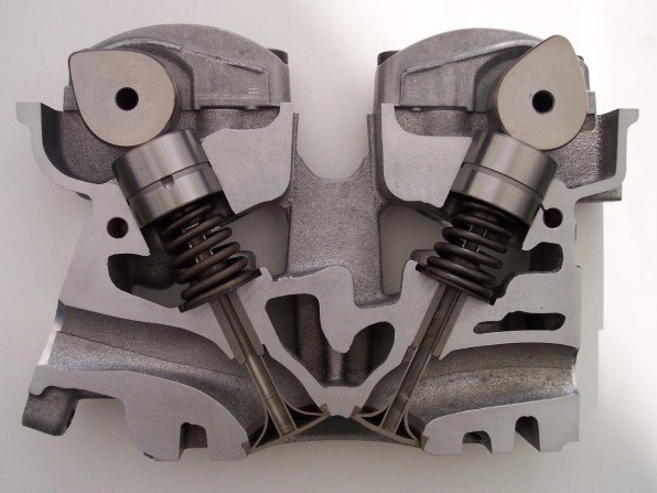  Cut through a DOHC cylinder head. 